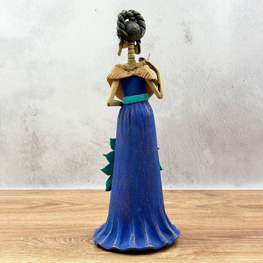 Catrina in a blue dress and pink flowers