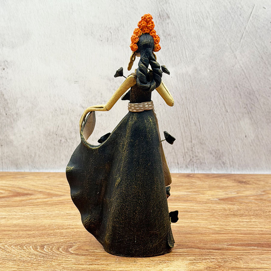 Catrina with black dress and marigold flowers