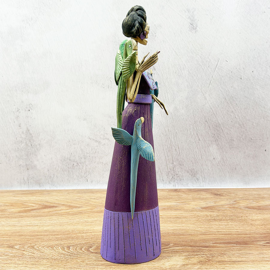 Catrina with purple dress and birds