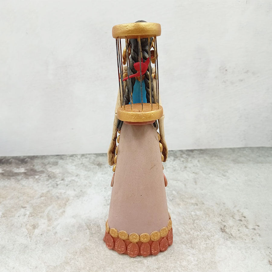 Catrina con jaula y pajarito rojo