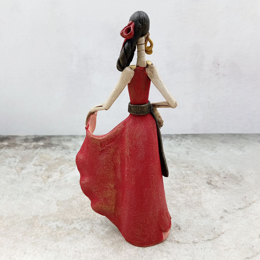 Catrina con vestido rojo y flores azules