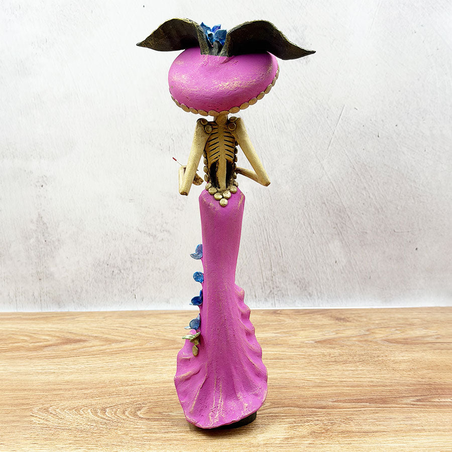 Catrina with a pink dress and hat