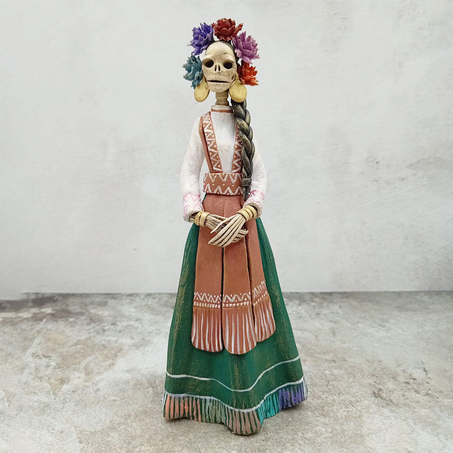 Catrina con tocado de flores de colores