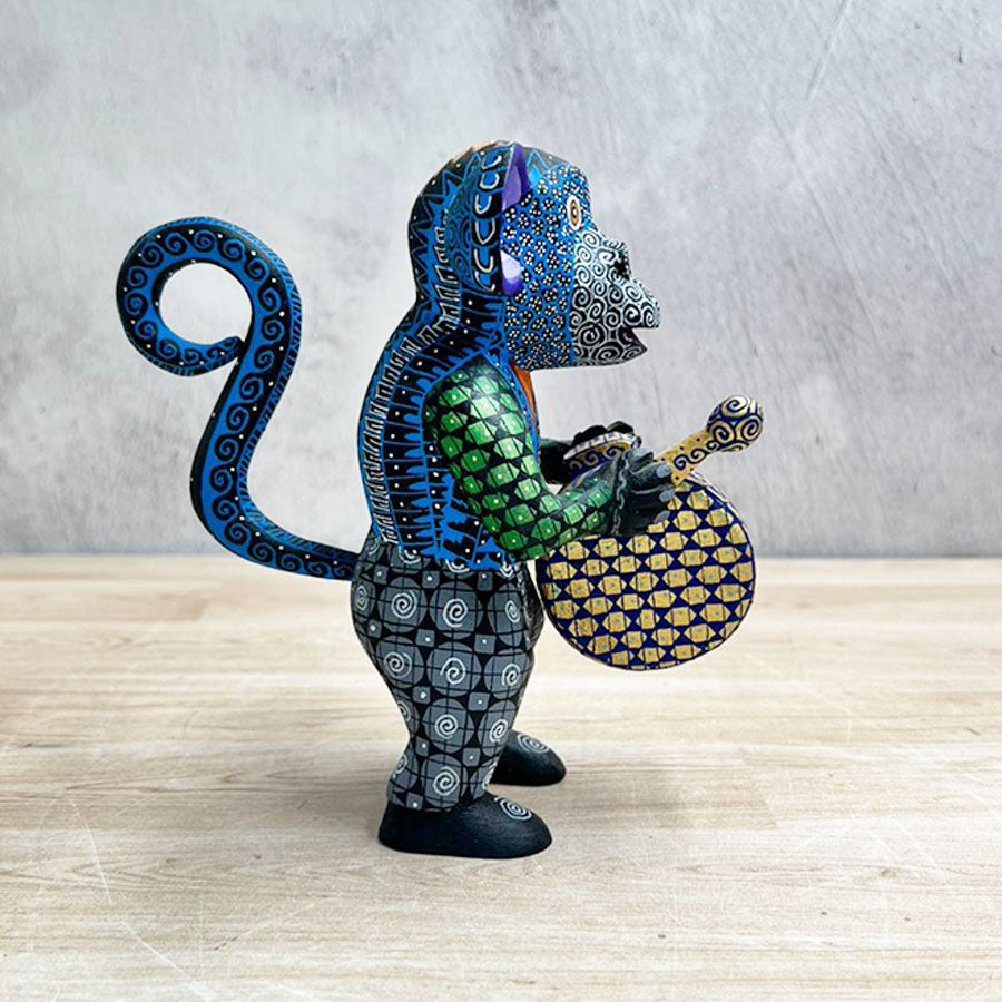 Blue alebrije monkey with drum