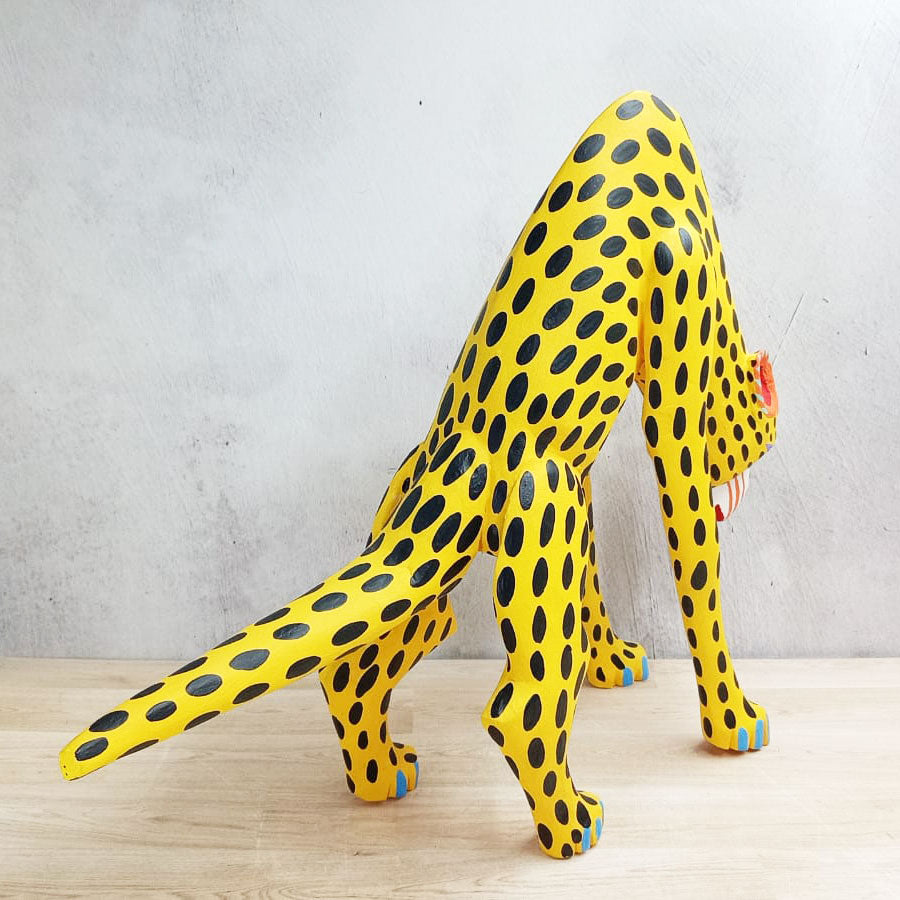 Yellow alebrije cheetah