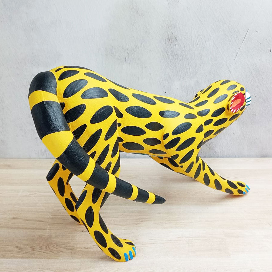 Crouching alebrije cheetah