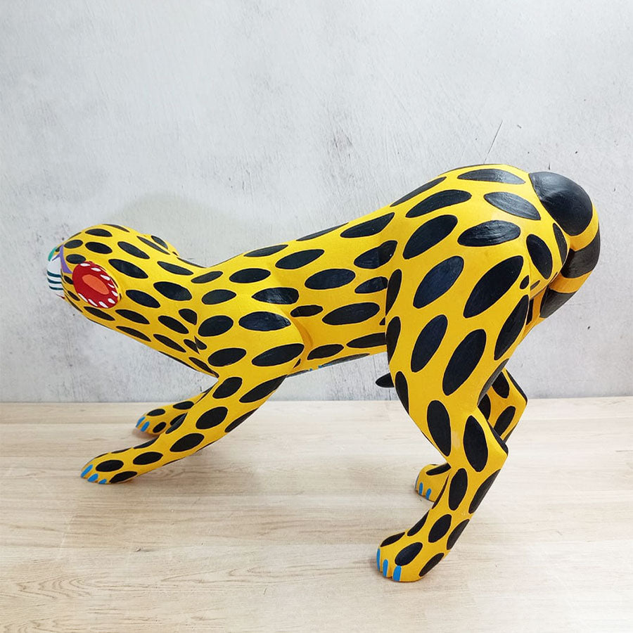 Crouching alebrije cheetah