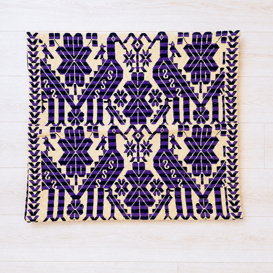Beige cushion cover with purple birds