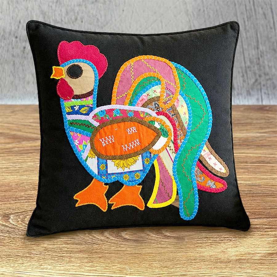 Black cushion cover with colorful rooster