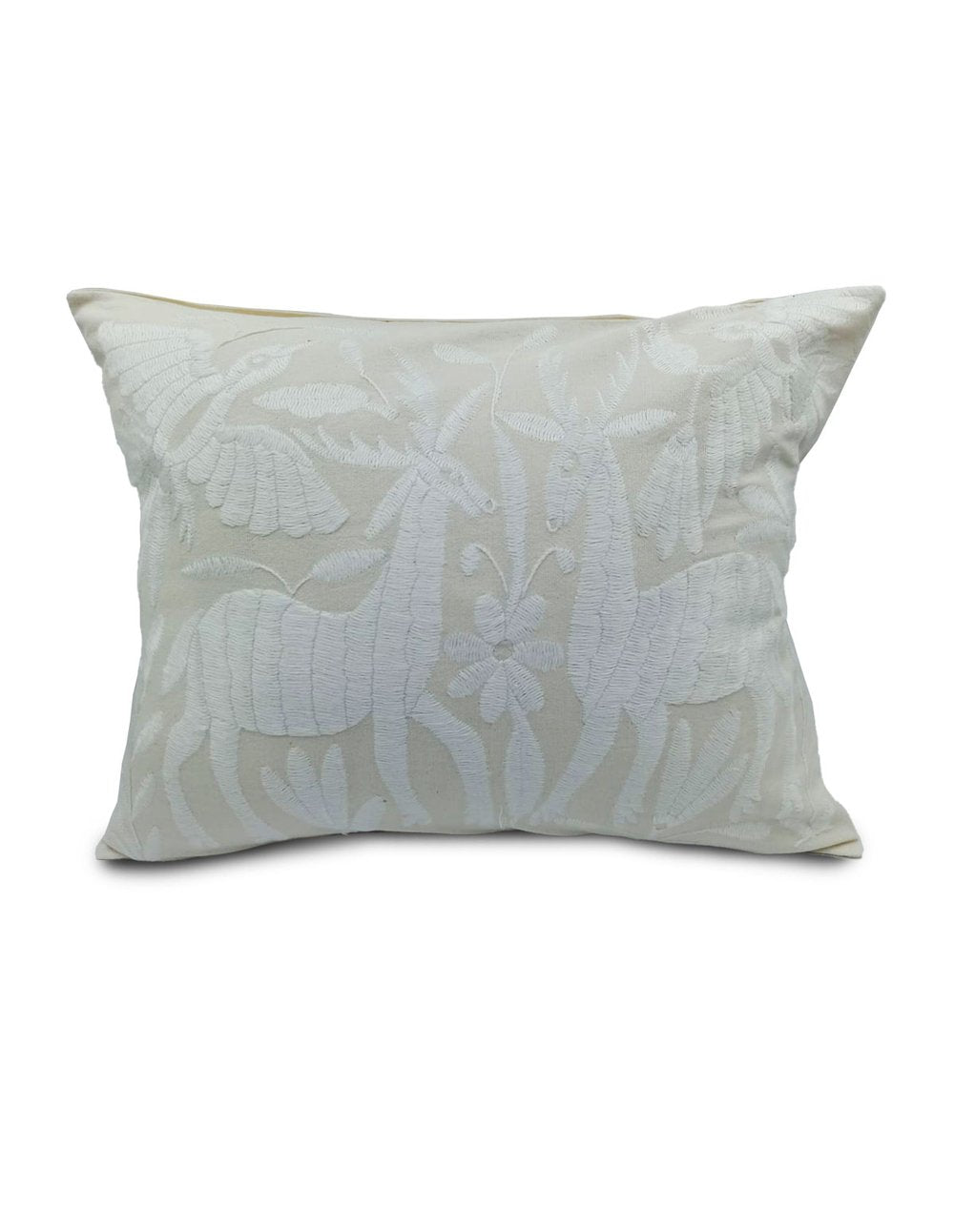 Beige cushion with white Otomi design