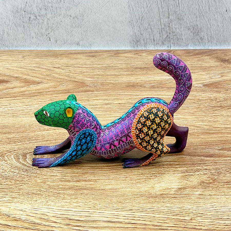 Purple alebrije weasel