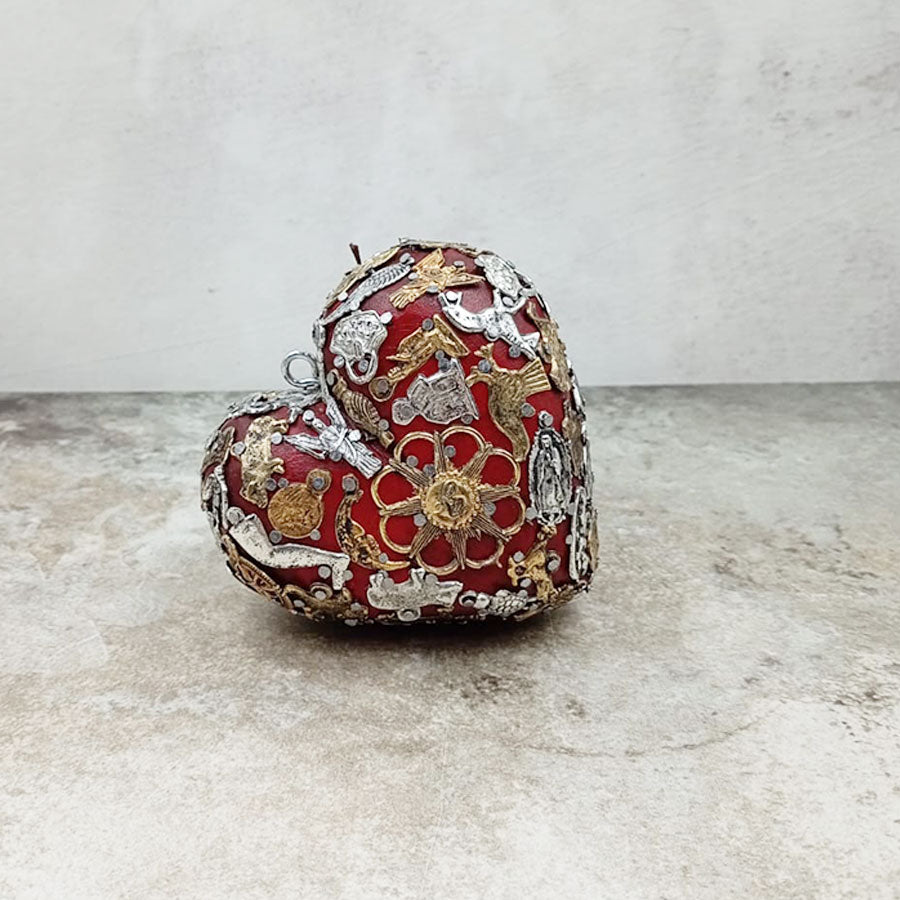 Double-sided heart with "milagritos"