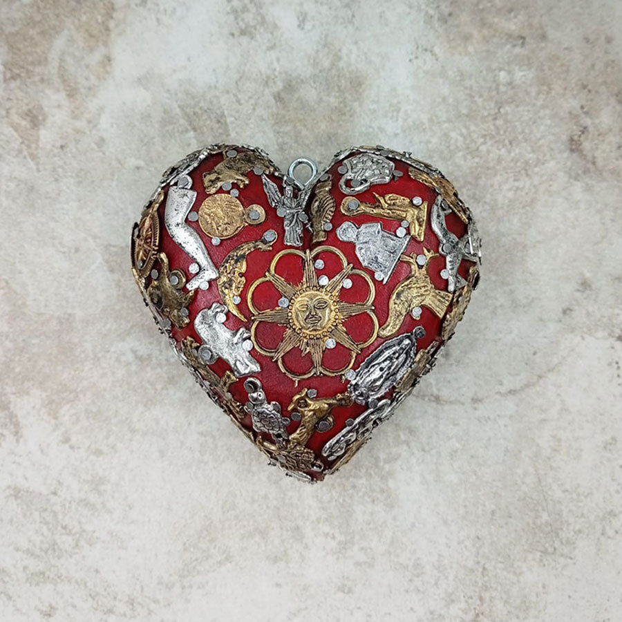 Double-sided heart with "milagritos"