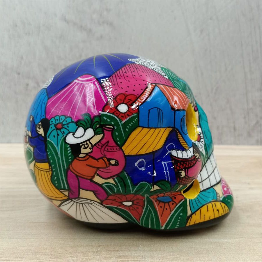 Small skull with country scenes