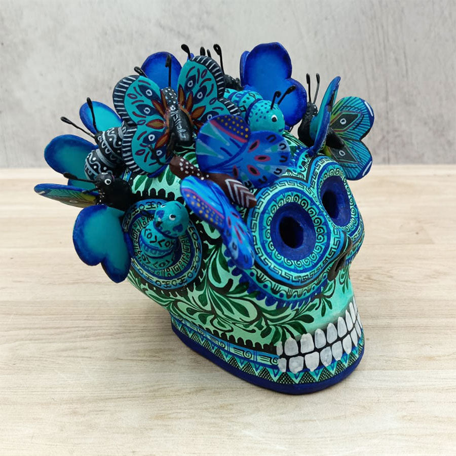 Blue skull with butterflies