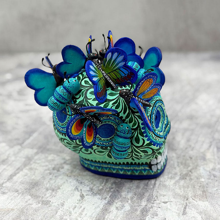 Blue skull with butterflies