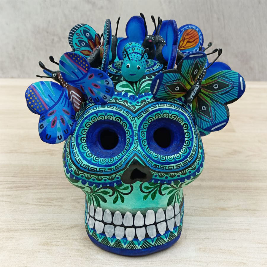 Blue skull with butterflies