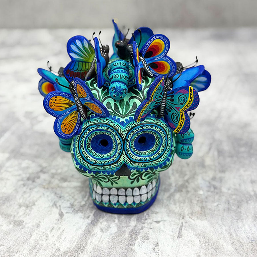 Blue skull with butterflies