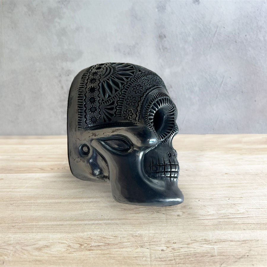 Openwork skull in black clay