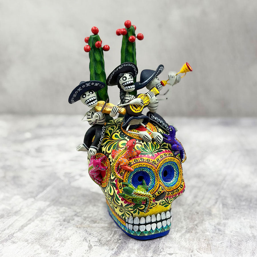 Skull decorated with little skull musicians