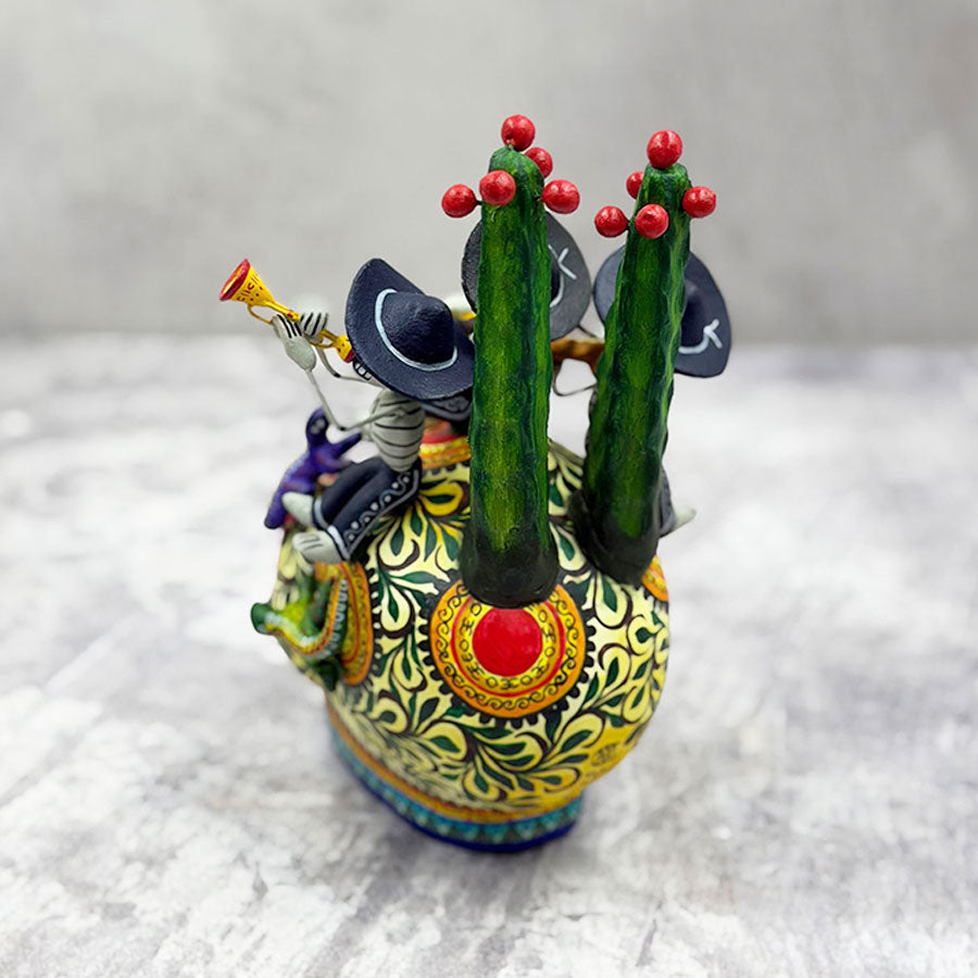 Skull decorated with little skull musicians