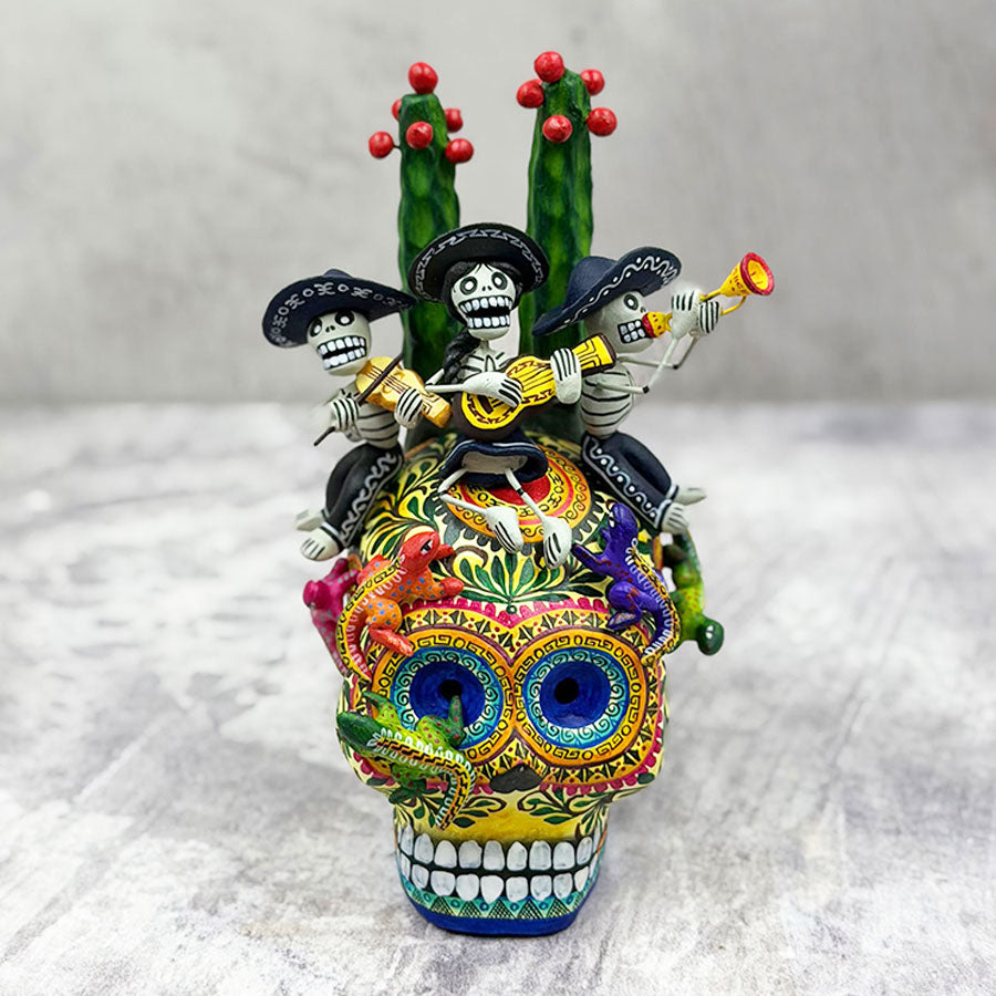 Skull decorated with little skull musicians