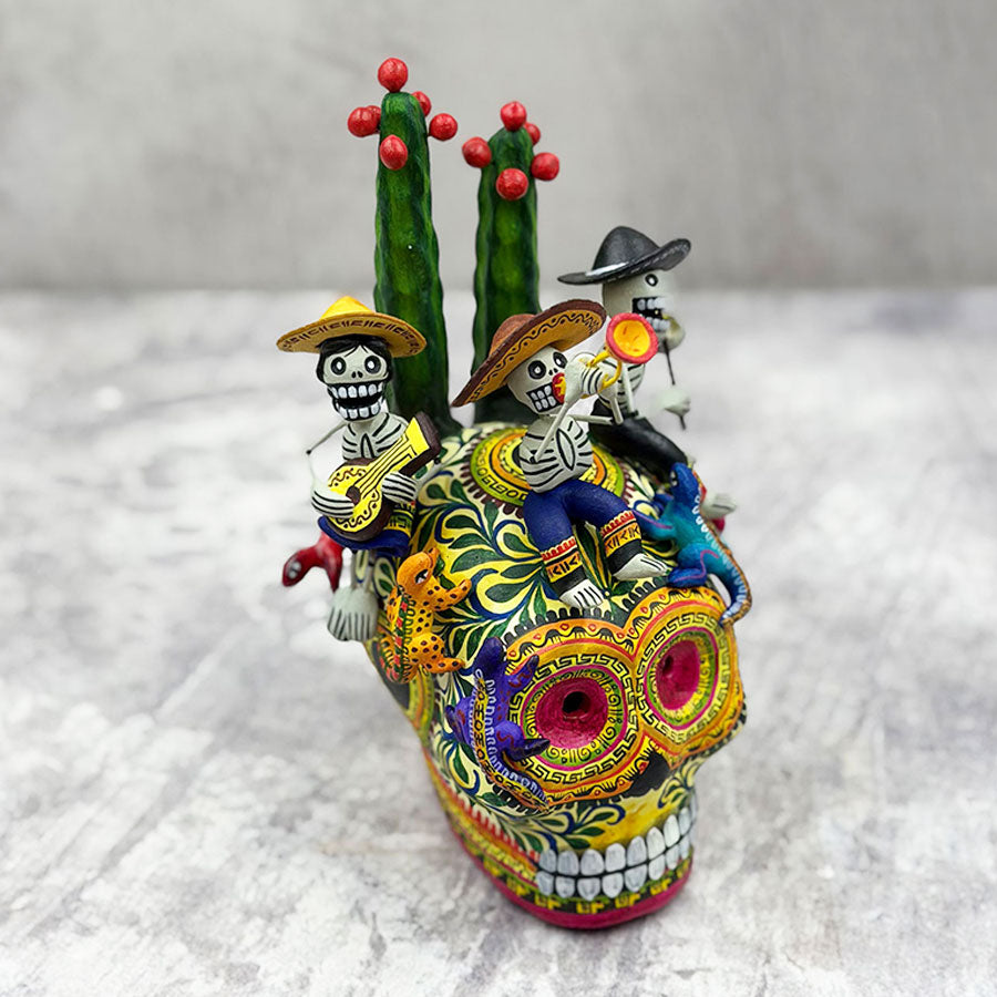 Skull decorated with little skull musicians