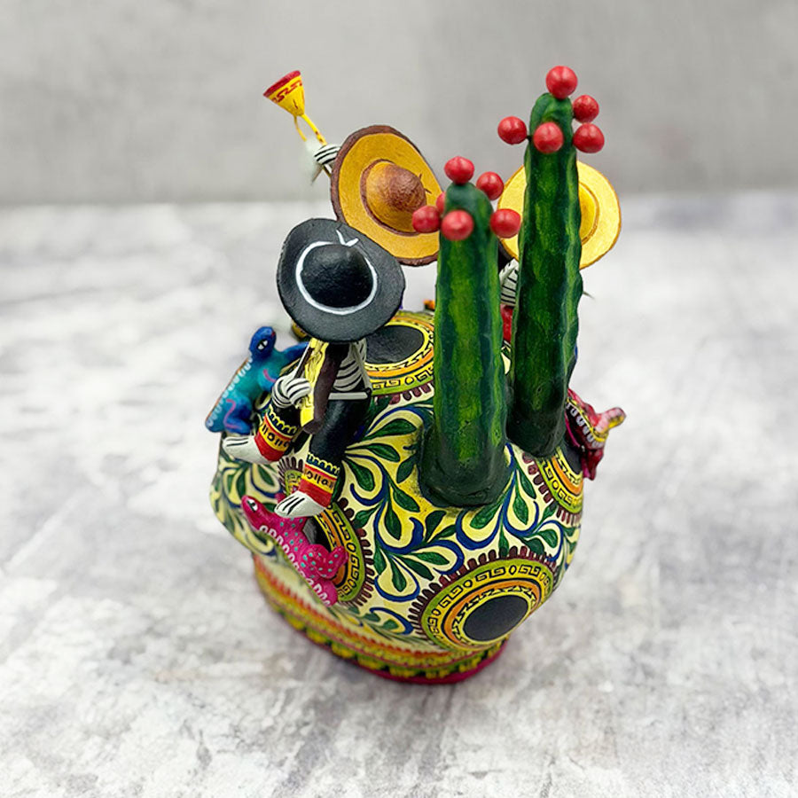 Skull decorated with little skull musicians