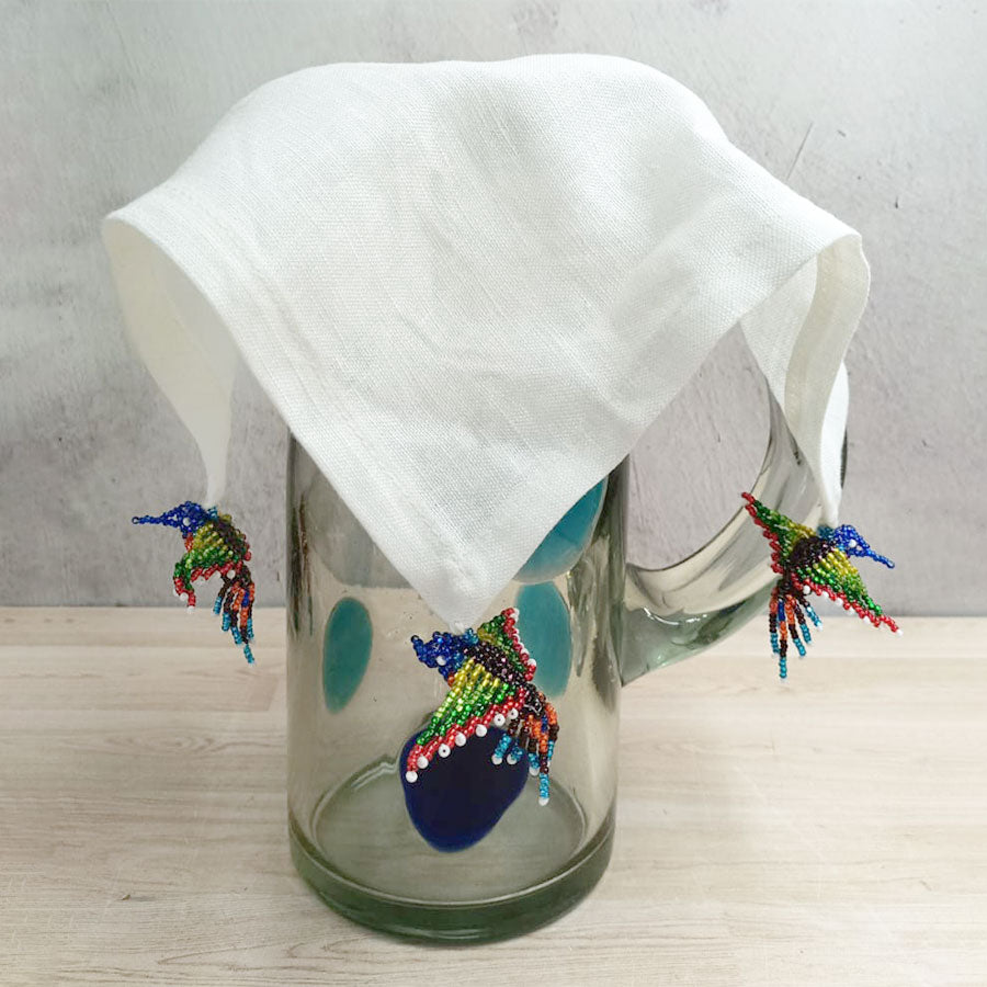 Cubre jarras con figuras de chaquiras