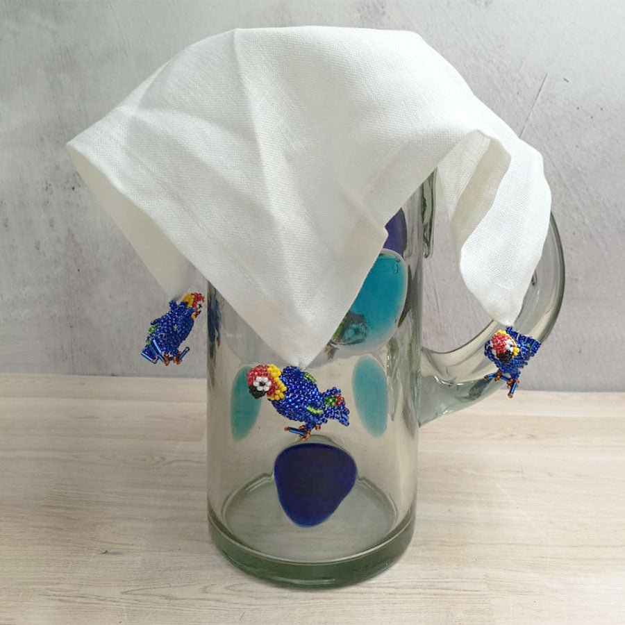 Cubre jarras con figuras de chaquiras