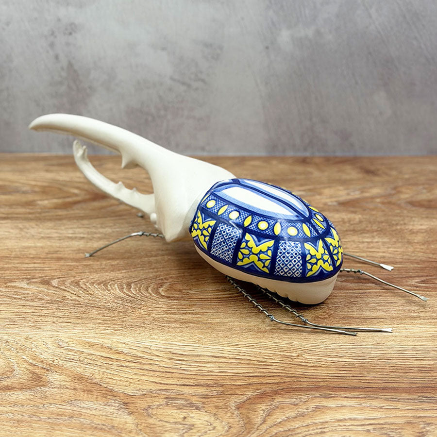 Figura escarabajo decorado