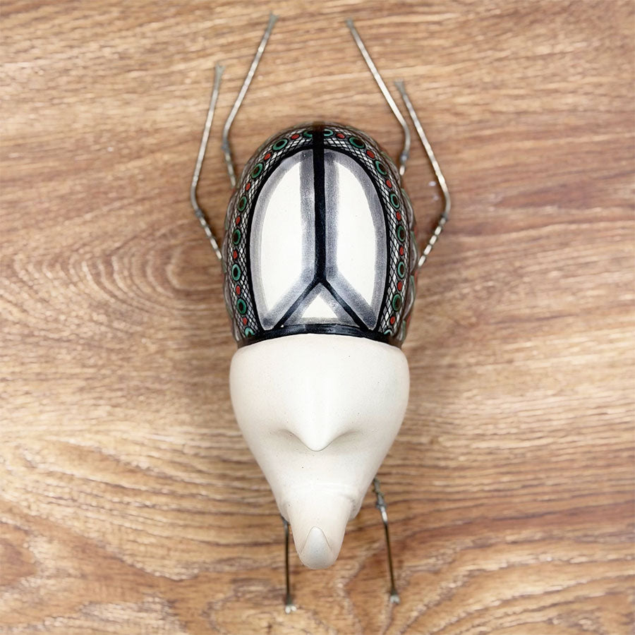 Figura escarabajo decorado