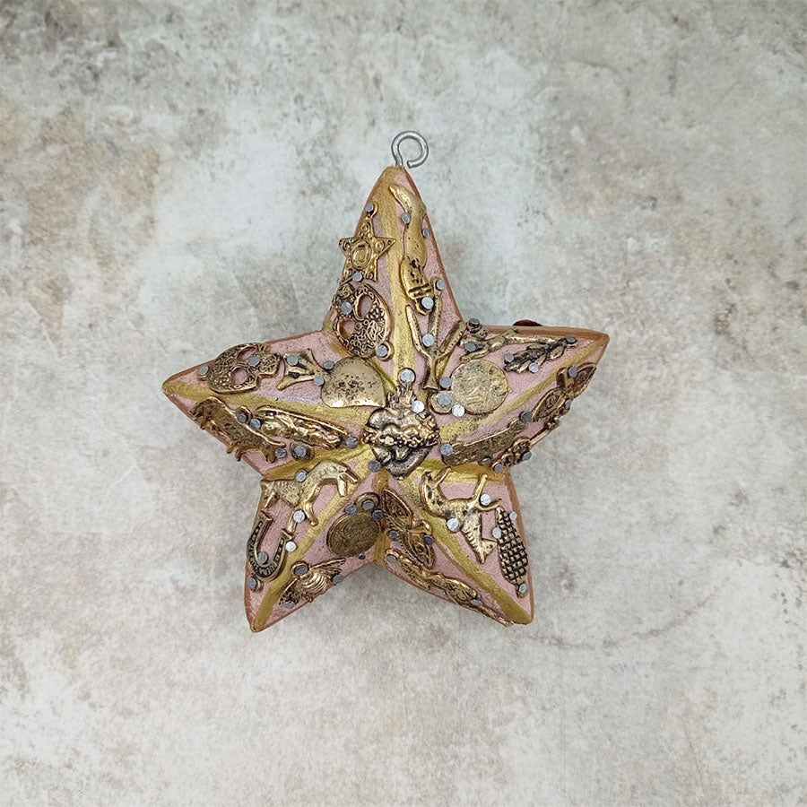 Double-sided star decorated with "milagritos"