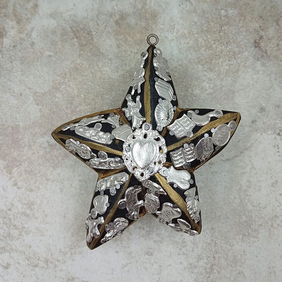 Double-sided star decorated with "milagritos"