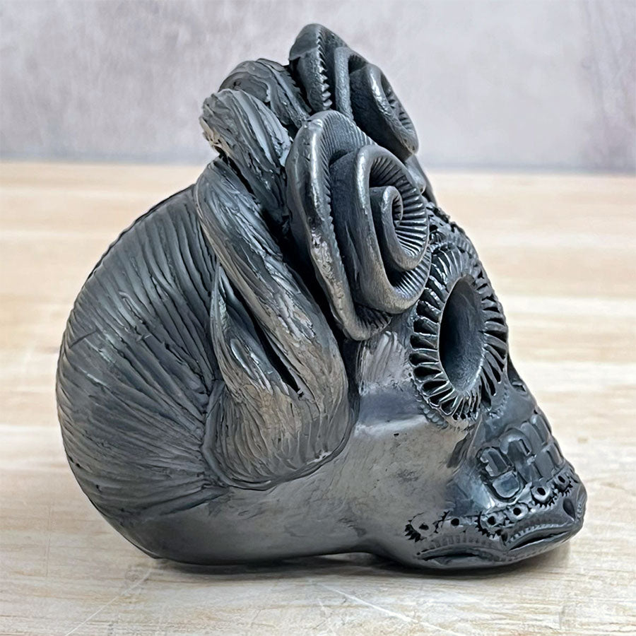 Catrina Frida with flowers in black clay