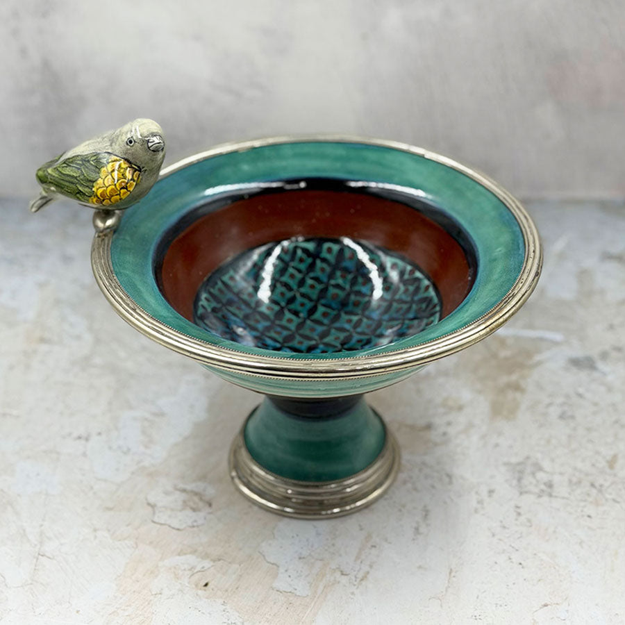Fuente verde con pajarito