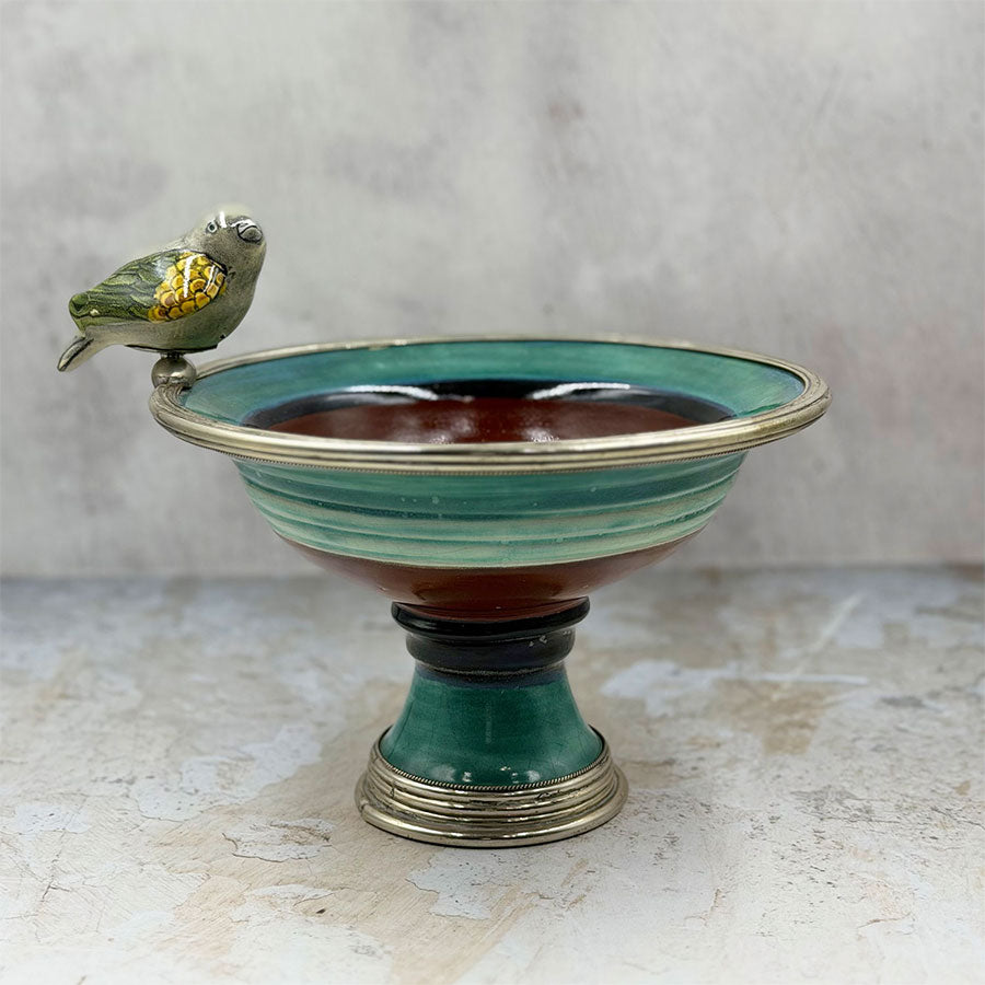 Fuente verde con pajarito