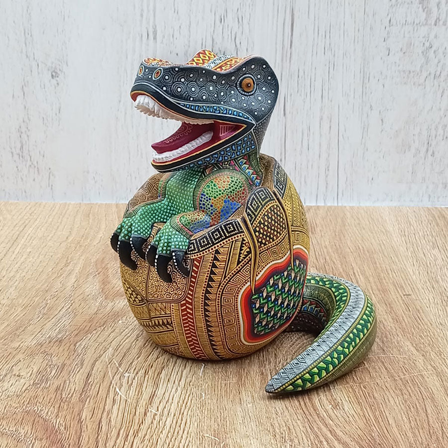 Alebrije-style egg with a dinosaur