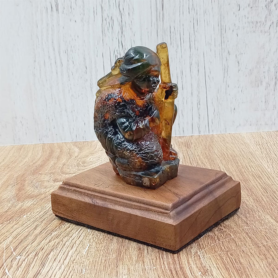 Zinacantec woman with a cane made of amber