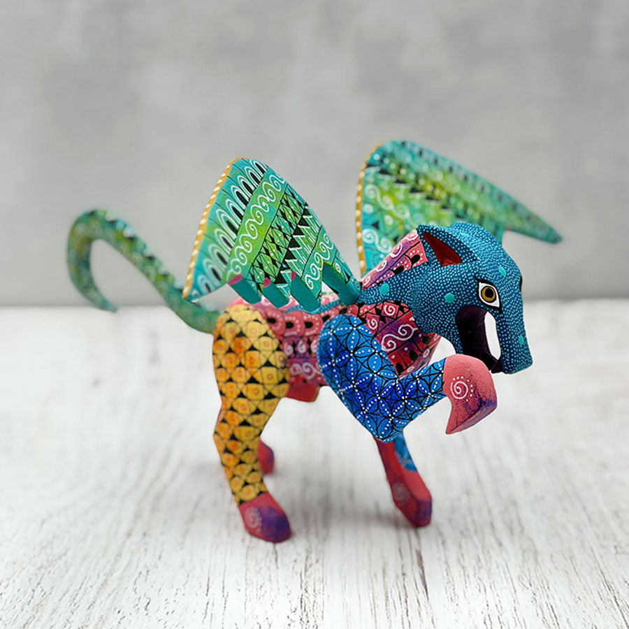 Jaguar alebrije with green wings