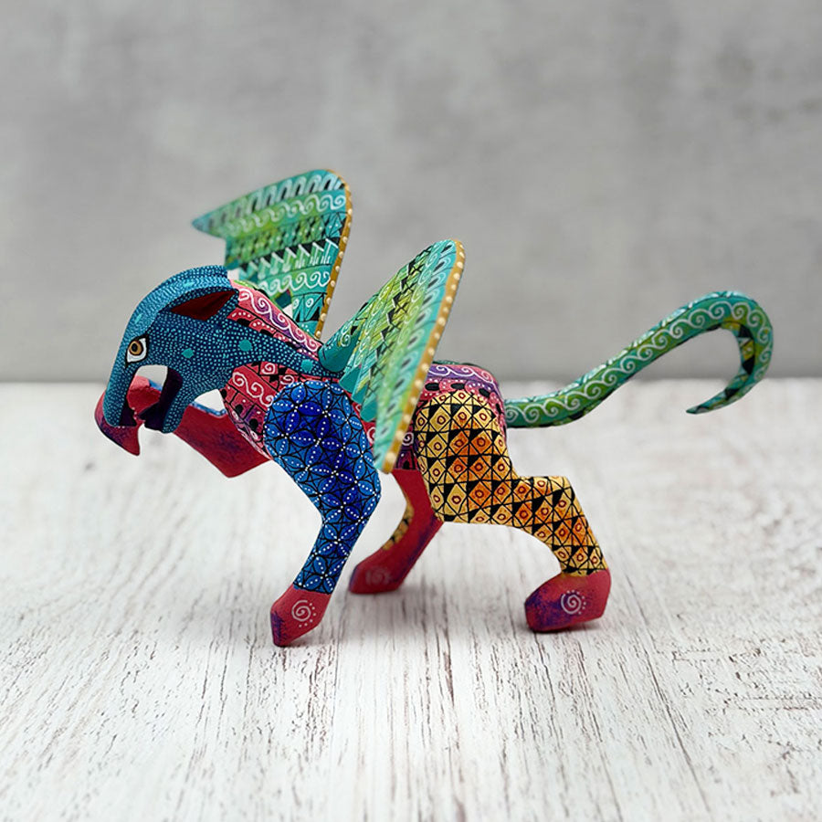 Jaguar alebrije with green wings