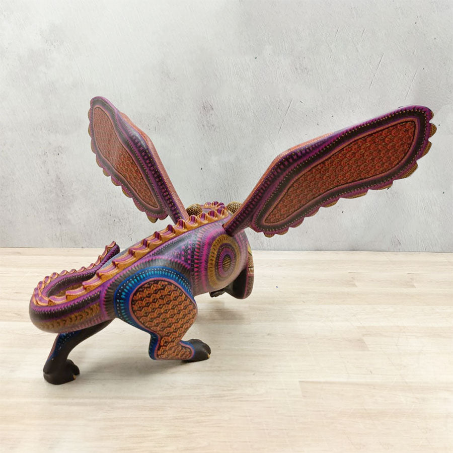 Jaguar alebrije con alas morado