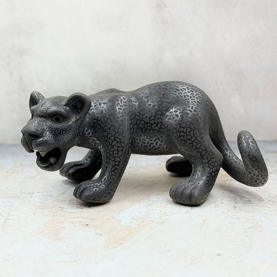 Black Jaguar roaring mini