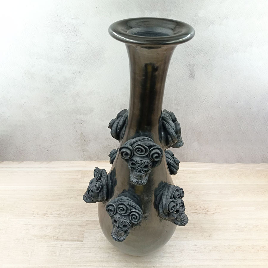 Vase with skulls