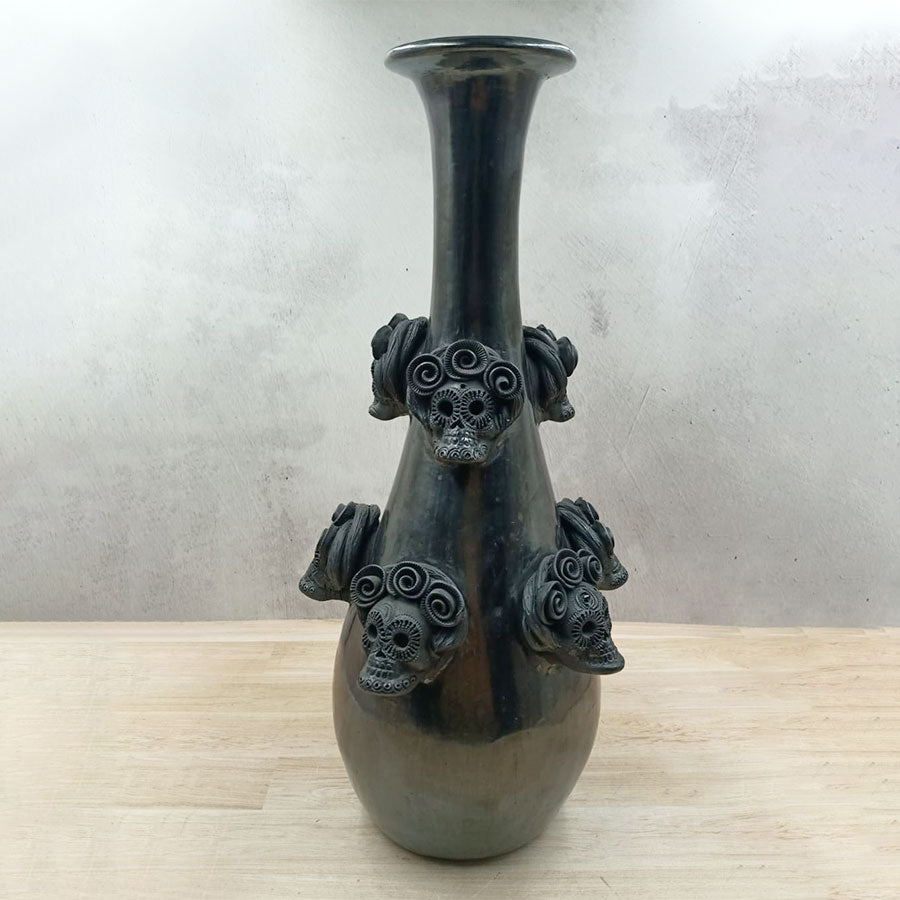 Vase with skulls