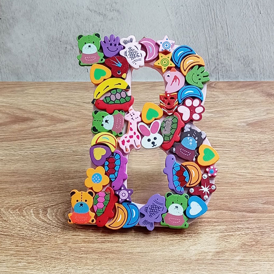 Letras del abecedario con figuritas de colores, de "A" a "G"