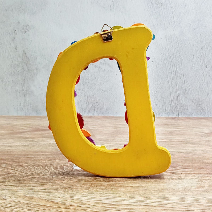 Letras del abecedario con figuritas de colores, de "A" a "G"