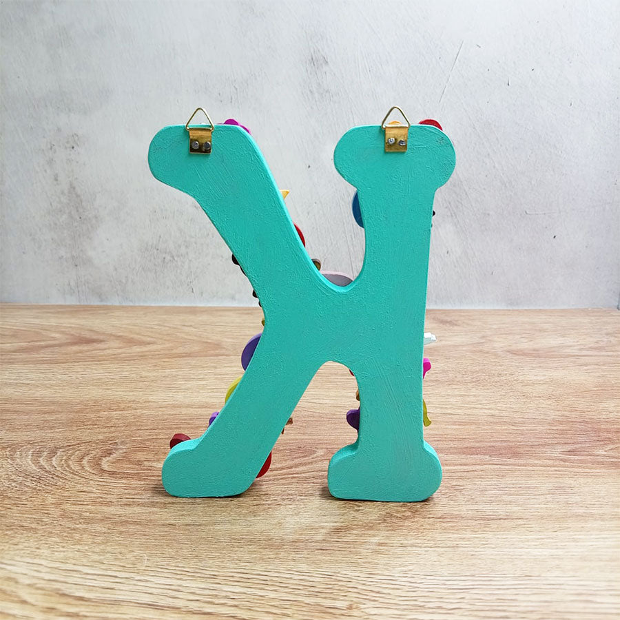 Letras del abecedario con figuritas de colores, de "H" a "M"