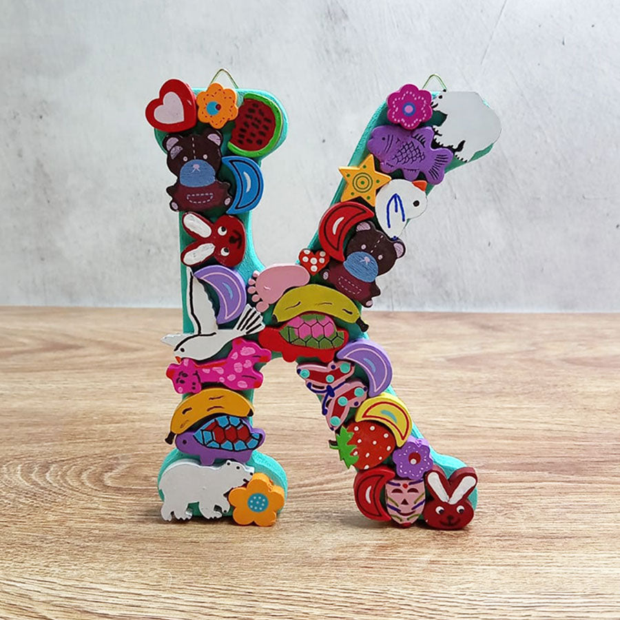 Letras del abecedario con figuritas de colores, de "H" a "M"