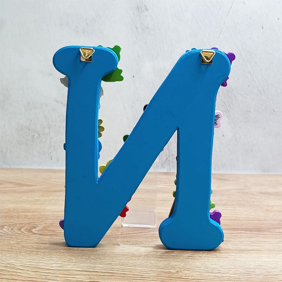 Letters of the alphabet with colorful figures, from  "N" to "T"